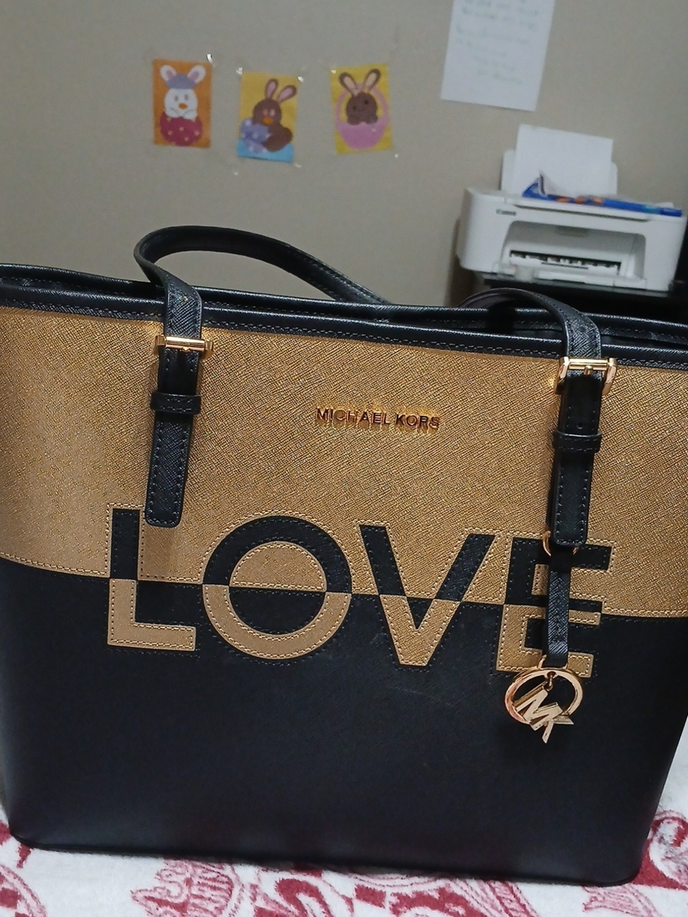 Michael Kors Limited edition, love.Shoulder Tote  bag Black and gold.  Bo tears